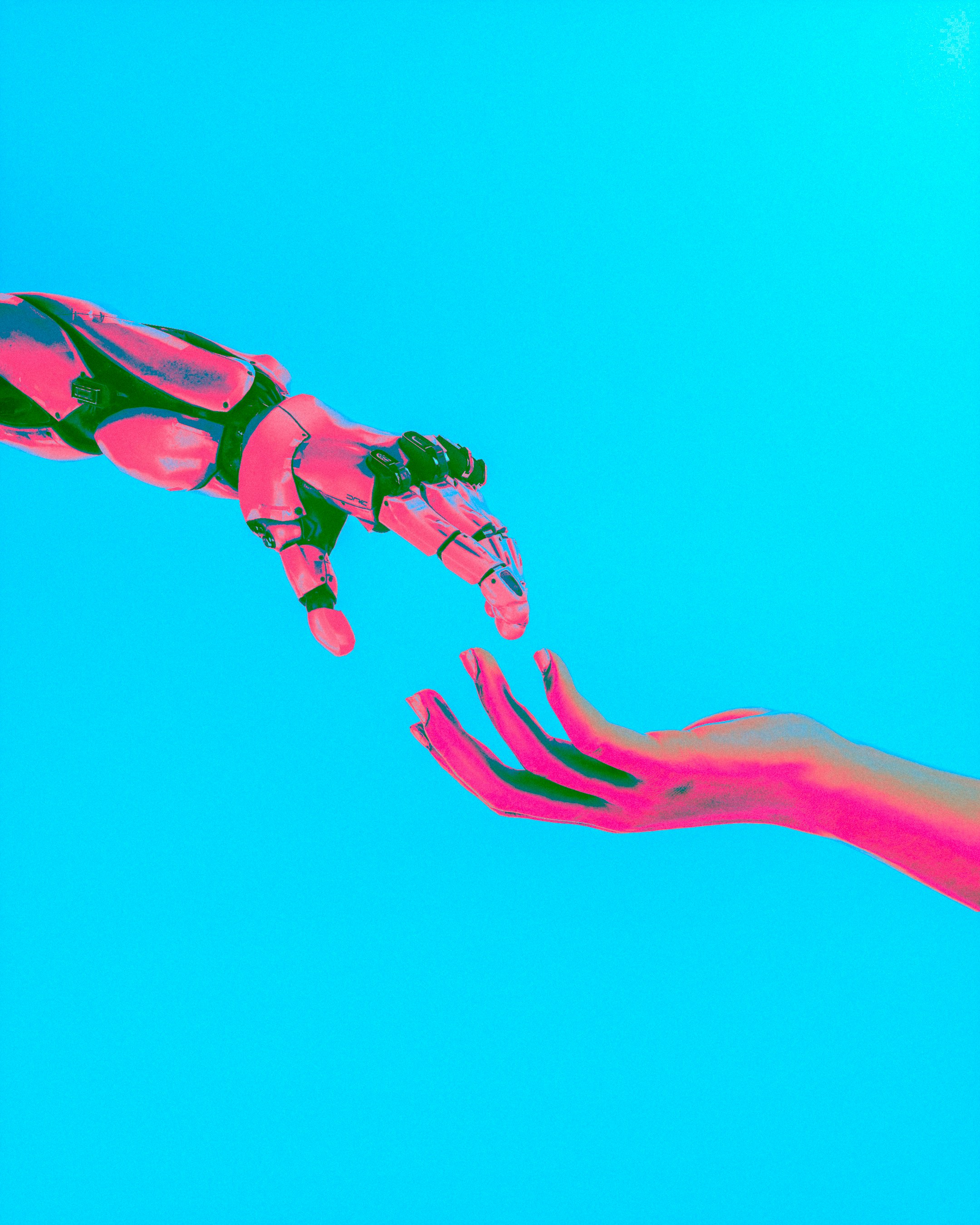 A robot hand and a human hand